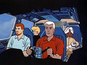 The Quest team from the 1964-1965 television series. Front row (left to right): Dr. Benton Quest and Roger "Race" Bannon. Back row: Jonny Quest, Hadji, and Bandit